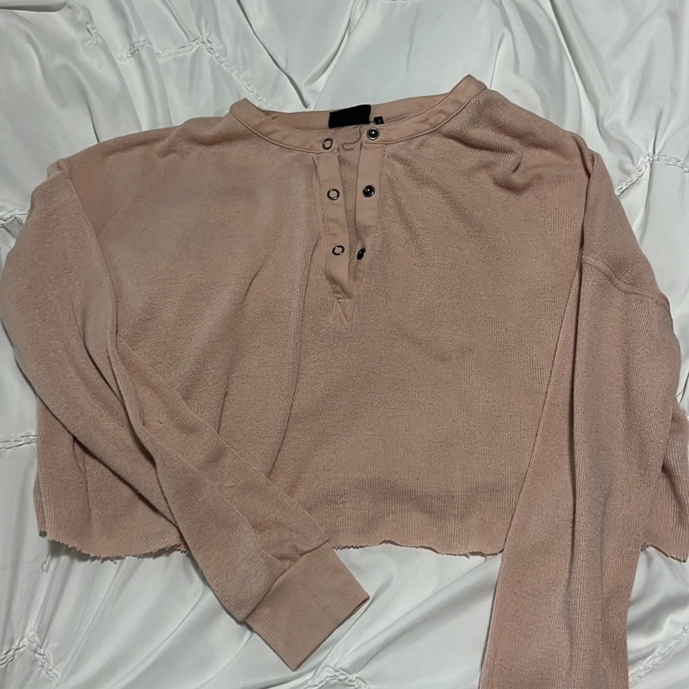 Out front under long sleeve crop top